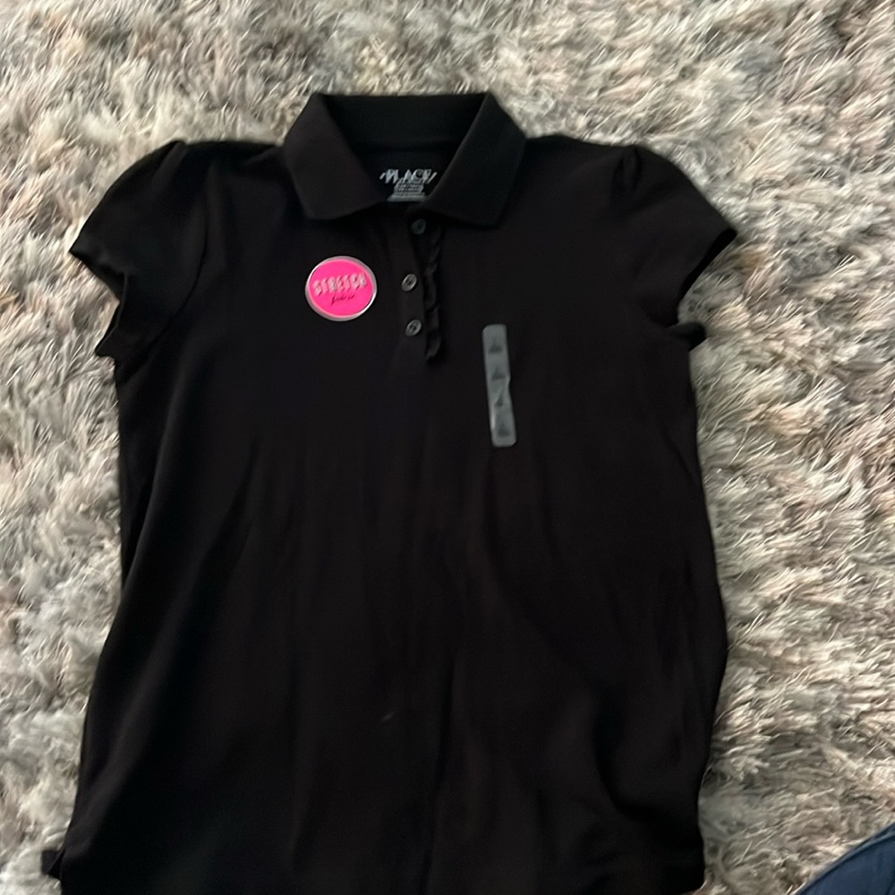 Girls size large black polo 10/12